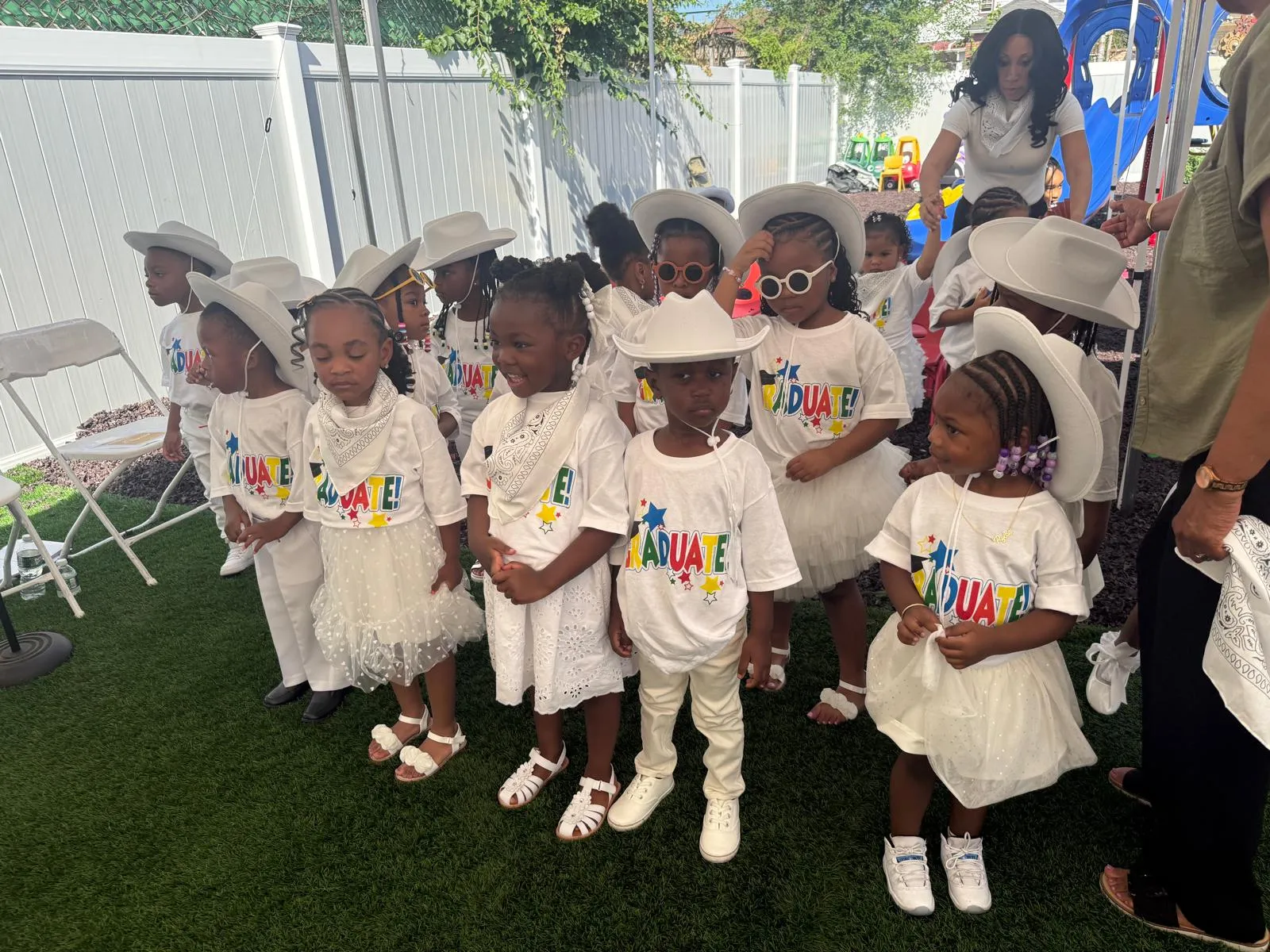 Children performing together during an early education programme